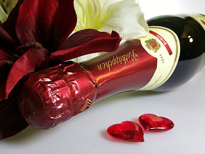 champagne bottle on white surface thumbnail