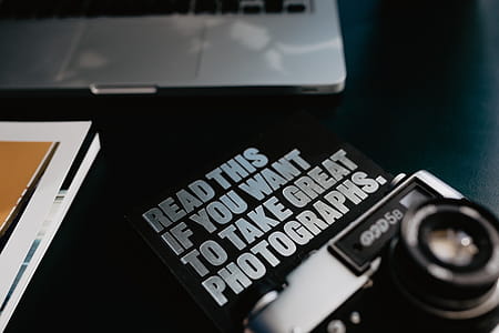 Old analog camera and photography book thumbnail