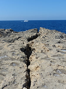 white boat on body of water thumbnail