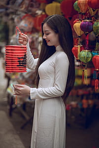 Woman Holding Red Chinese Lantern thumbnail