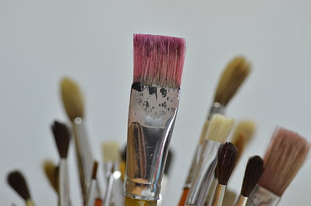 selective focus photography of makeup brush thumbnail