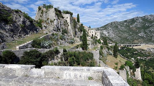 photo of ruins on mountain slope thumbnail