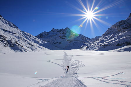 people walking on snow land thumbnail