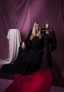 woman holding sword in studio thumbnail