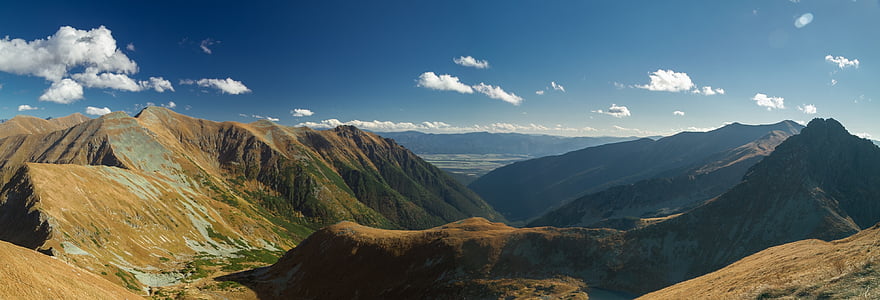 aerial view of mountain covered with trees thumbnail