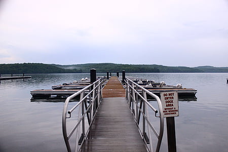 brown wooden dock at daytime thumbnail