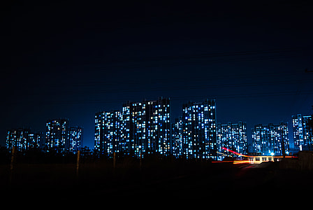 high rise buildings with turn on lights thumbnail