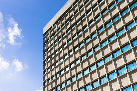 low-angle photography of gray high-rise building thumbnail