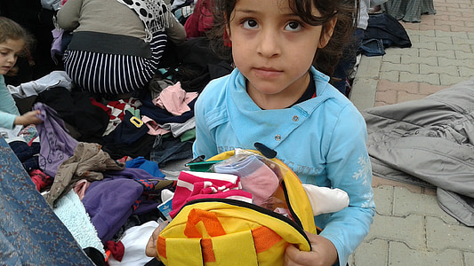 girl holding yellow backpack thumbnail