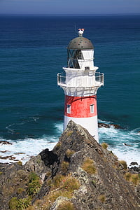 white and red light tower thumbnail