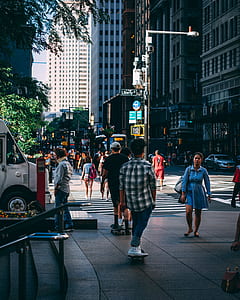 group of people crossing pedestrian lane thumbnail