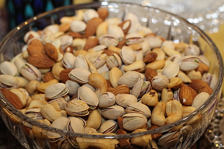 almonds on clear glass bowl thumbnail