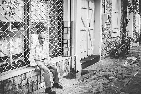 man sitting on bench thumbnail