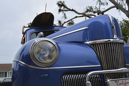 close-up photo of classic blue vehicle thumbnail