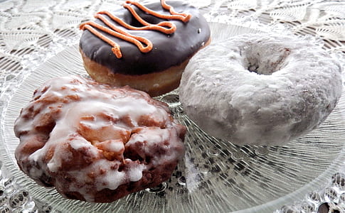 several doughnuts on plate thumbnail