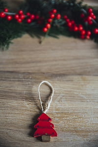 shallow focus photography of red tree ornament thumbnail