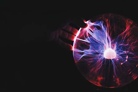 person touching plasma ball thumbnail