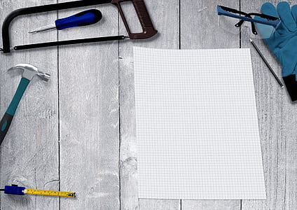 white paper beside hacksaw thumbnail