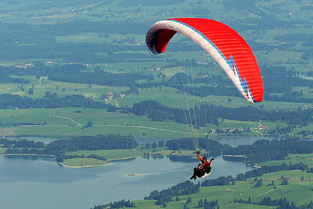 person parachuting during daytime thumbnail