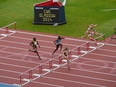 five women running on field thumbnail