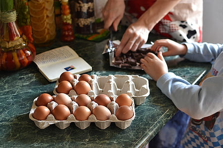 pile of organic eggs on tray on green tile table thumbnail
