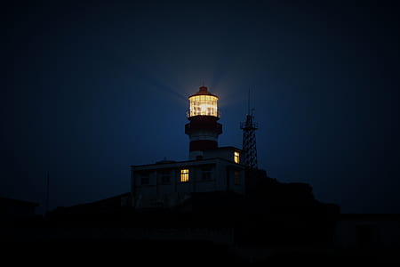 turned on red and white lighthouse thumbnail