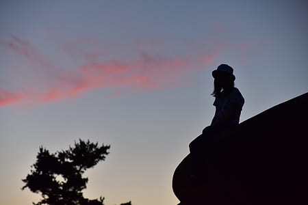 silhouette of woman sitting thumbnail