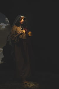 woman holding white lantern thumbnail