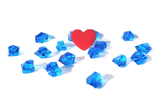blue jeweled on white surface thumbnail