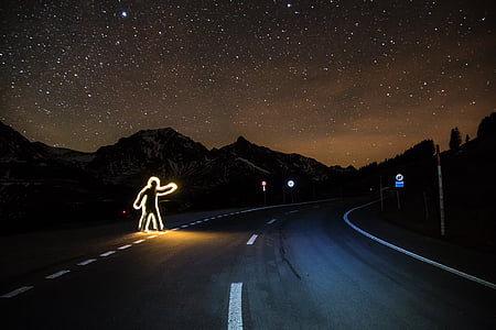 man crossing road time lapse photography thumbnail