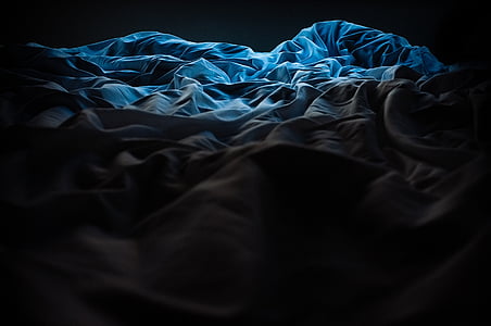 blue and white textile thumbnail