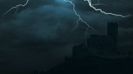 silhouette of buildings during thunder thumbnail