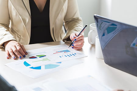 Woman Reads Through Meeting Info Photo thumbnail