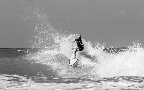 Grayscale Photography of Surfer thumbnail