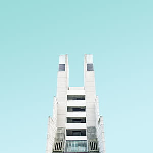 low angle of white and gray concrete building thumbnail