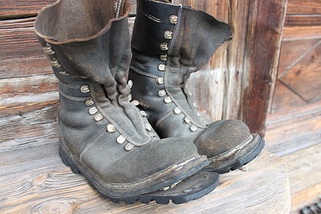 pair of black leather boots thumbnail