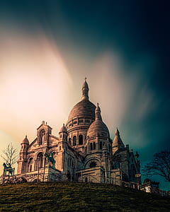gray concrete cathedral on hill thumbnail