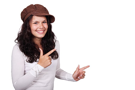 woman smiling while both hands pointing thumbnail
