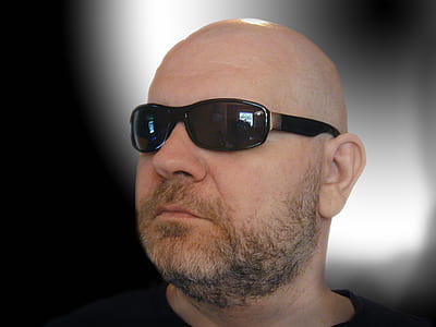 man wearing black framed sunglasses thumbnail
