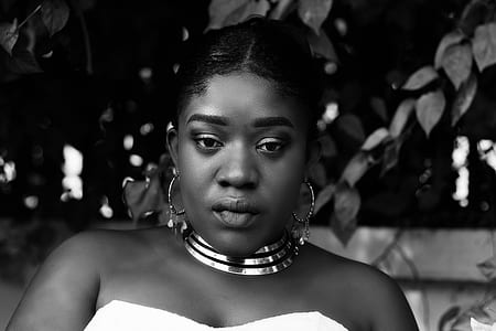 grayscale photo of woman in white top thumbnail