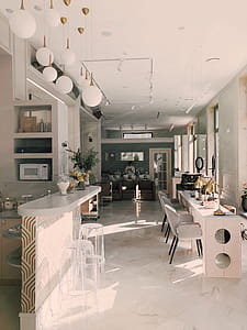 White Dining Table Near Bar Table thumbnail