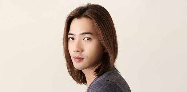 person wearing black shirt thumbnail