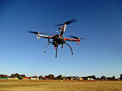 red and black drone flying on air thumbnail