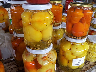 fermented yellow fruits inside jar thumbnail