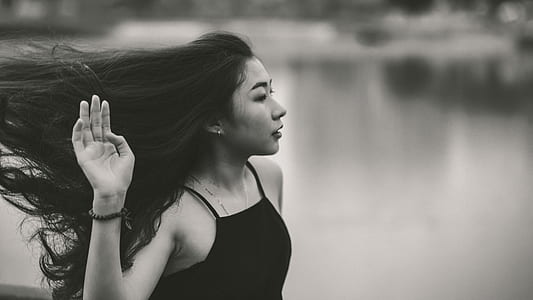 Grayscale Photo of Woman in Spaghetti Strap Top thumbnail