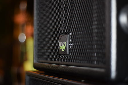 Black Speaker On Brown Wooden Stand thumbnail