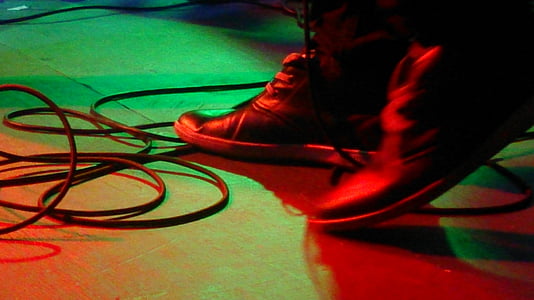 person wearing black leather shoes thumbnail
