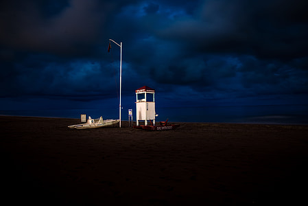 white booth under blue sky thumbnail