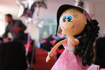 girl wearing pink dress doll thumbnail