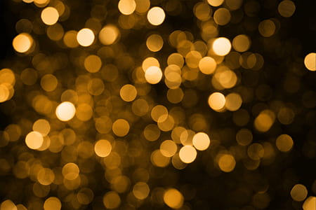 bokeh photography of brown specks of light thumbnail